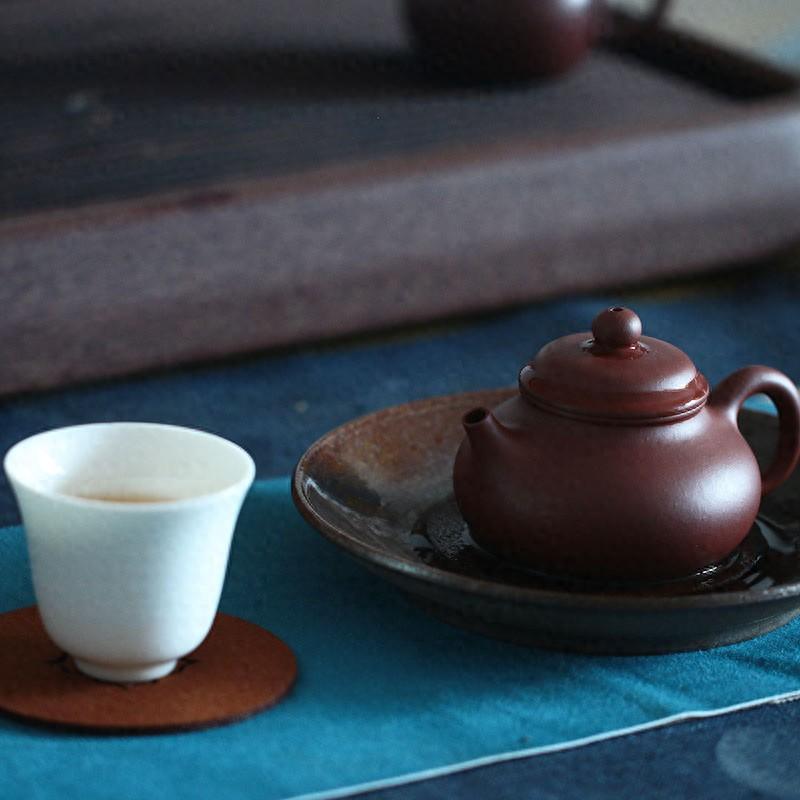 用紫砂壶喝茶能给男人带来舒适感和安稳感