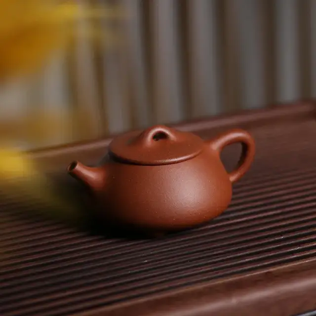 从周孟平的紫砂壶看宜兴紫砂的独特魅力